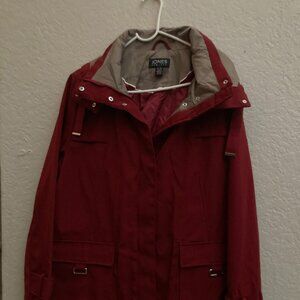 A  XL Jones of New York  Hooded rain coat Very nice deep red color. It has all.
